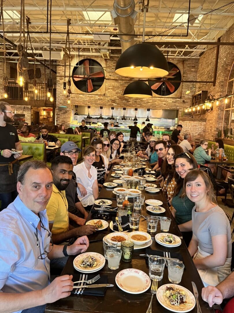 Group of friends enjoying a meal at a restaurant.